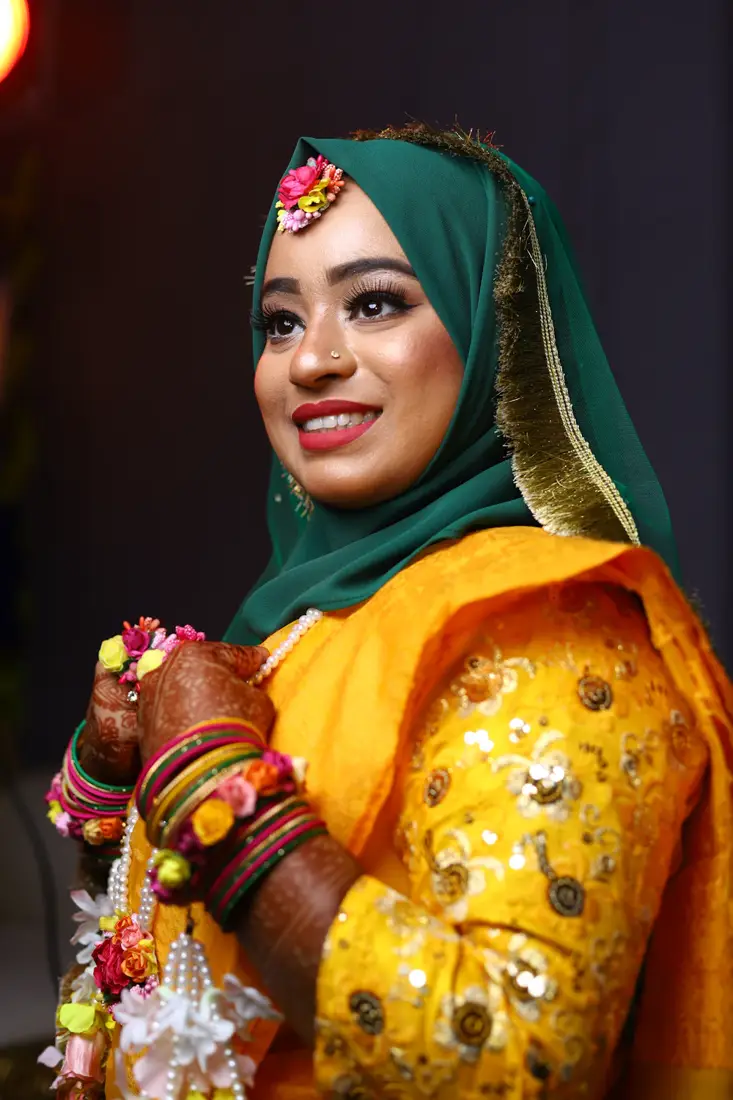 Bride in yellow at her Mayun