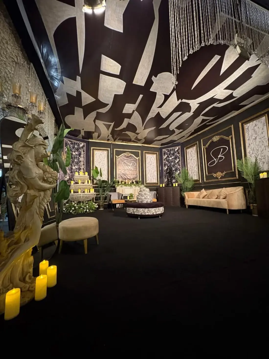 Black and gold monogram lounge for a private dinner party by Events by OT