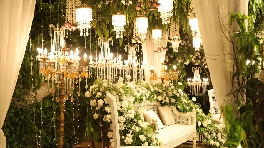 Stage seating with white roses by Events by OT