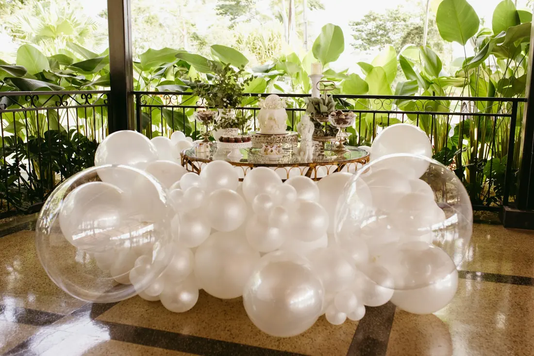 White balloon dessert table styling by Events by OT